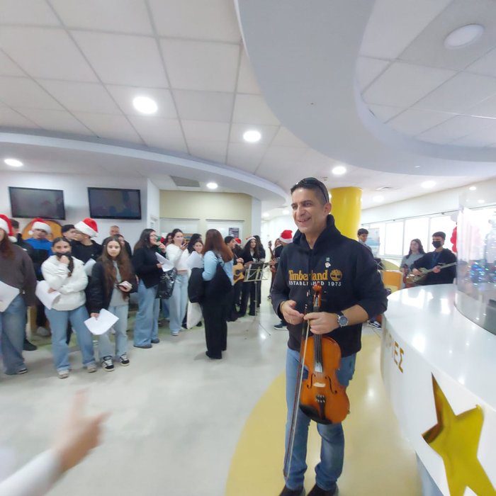 Graphic of Apostolos Markos High School students singing at Makarios Hospital